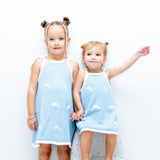 Child in dolphin print sun dress - Dad Dressed Me Just Keep Swimming summer staple
