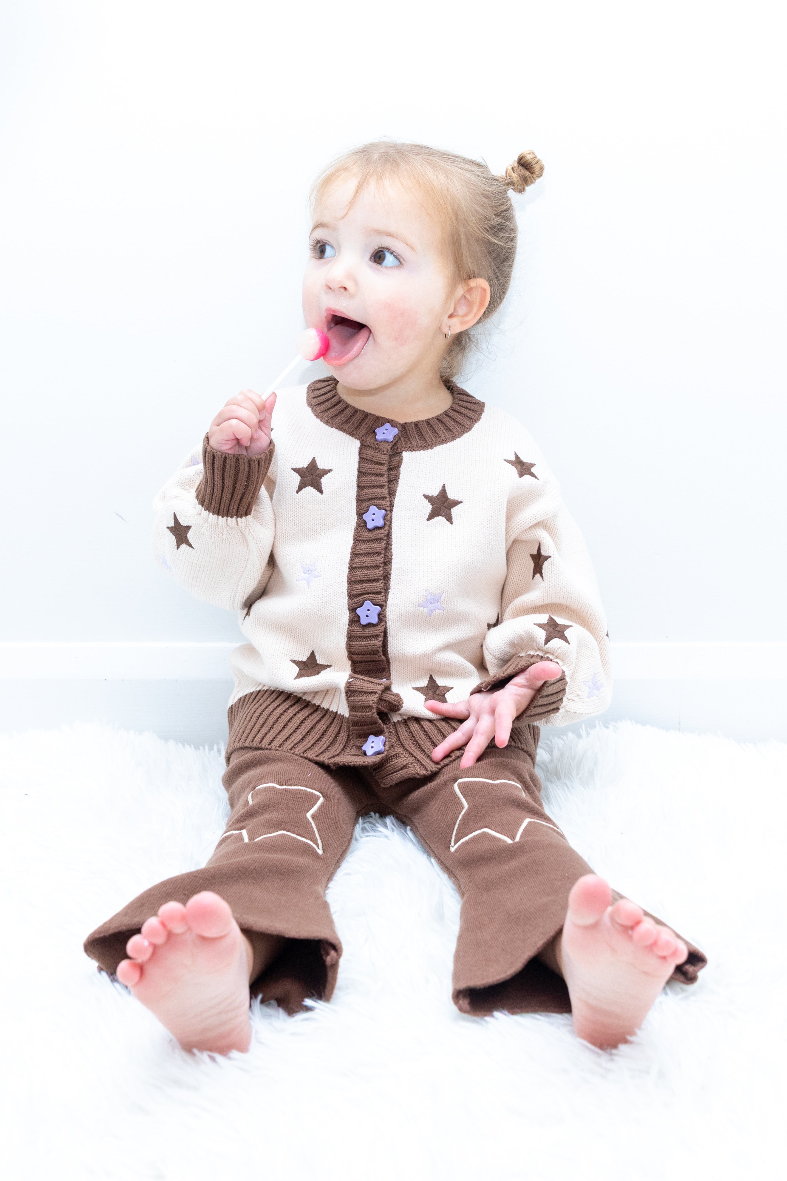 Toddler wearing the Starry Flare Pant styled with the Twinkle Twinkle Cardi