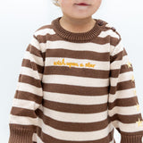Close-up of the Wish Upon a Star Romper embroidery and star sleeve detail