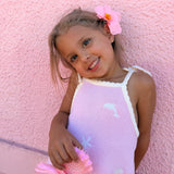 Embroidered dolphin and starfish detail on pink knit sun dress