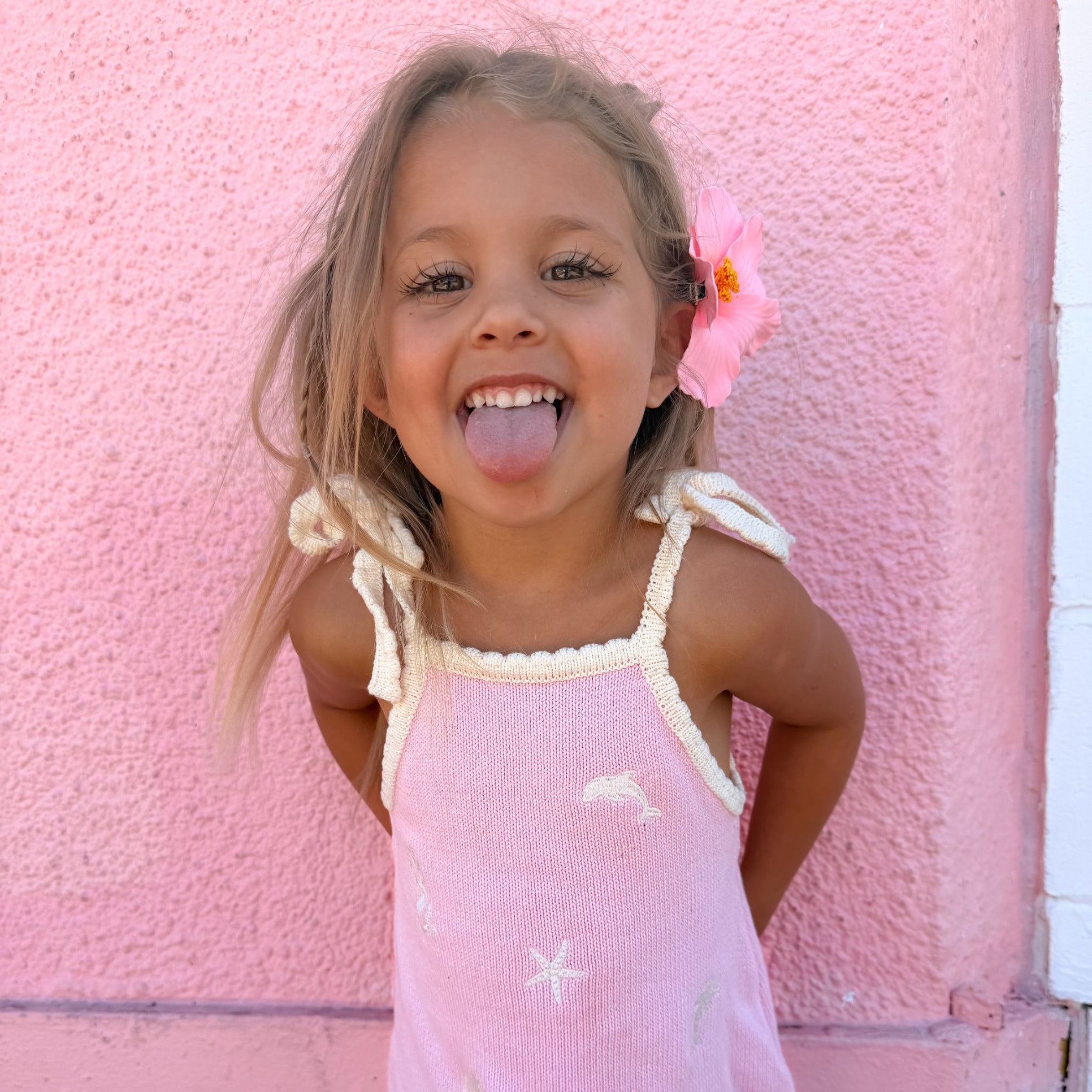 Pink Just Keep Swimming sun dress with cream tie straps and scalloped neckline