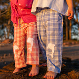 Little Dolphin Club Pants detail — dolphin jacquard knit