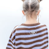 Back of the Cosmic Tee showing the embroidered DDM logo